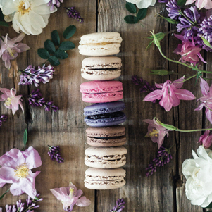 Colorful macaroons and flowers