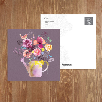 Watering can with flowers